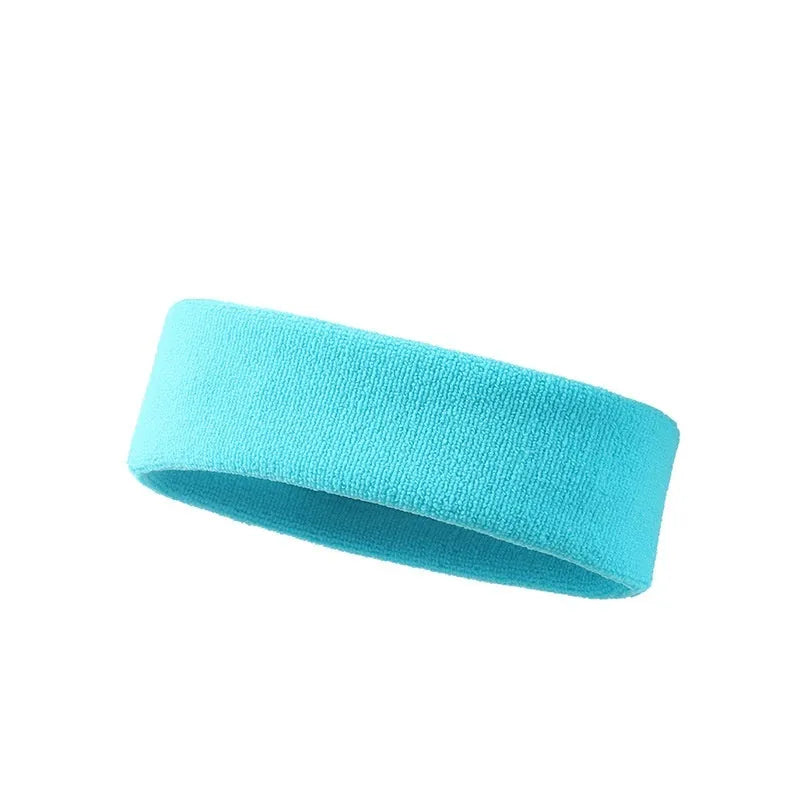 A widened solid colour sports headband made from elastic polyester spandex, shown in one of five available colours.