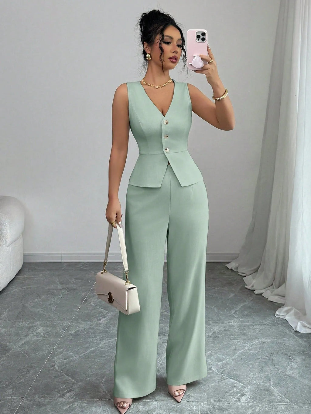 Women's solid colour sleeveless vest and high waist trousers two-piece casual set.