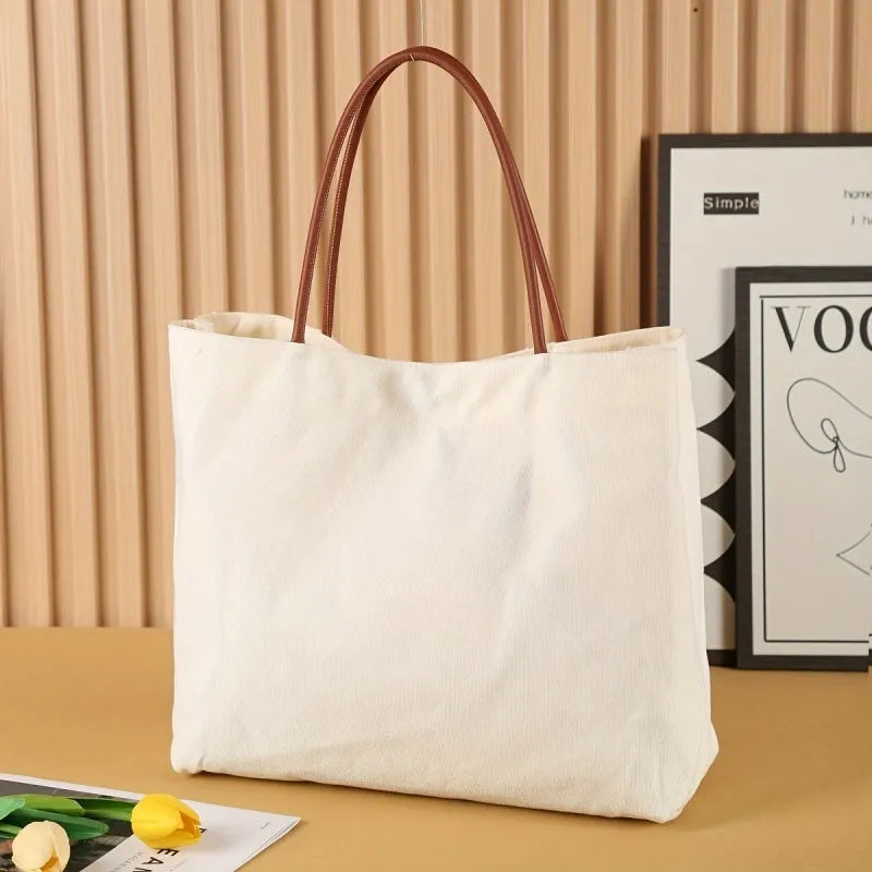 Beige white canvas tote bag with 40 litre capacity and double handles