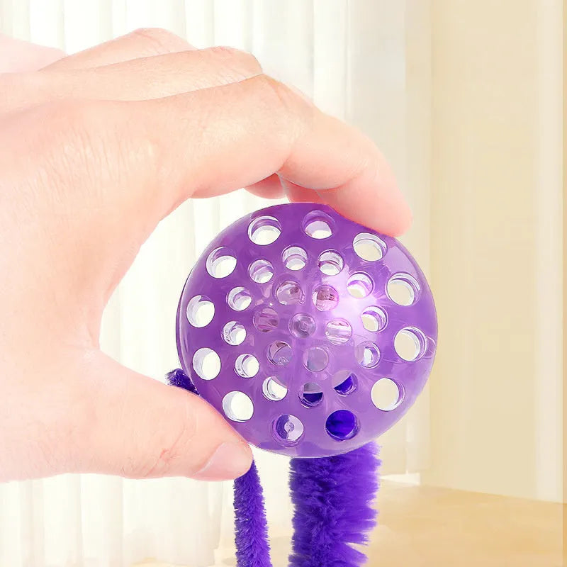 Interactive bouncy ball cat toy with elastic tail in TPR and plush materials