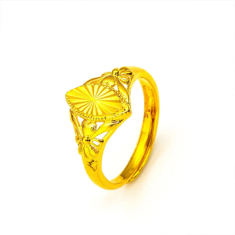 Gold electroplated brass ring with open diamond flower geometric design and textured elements for women