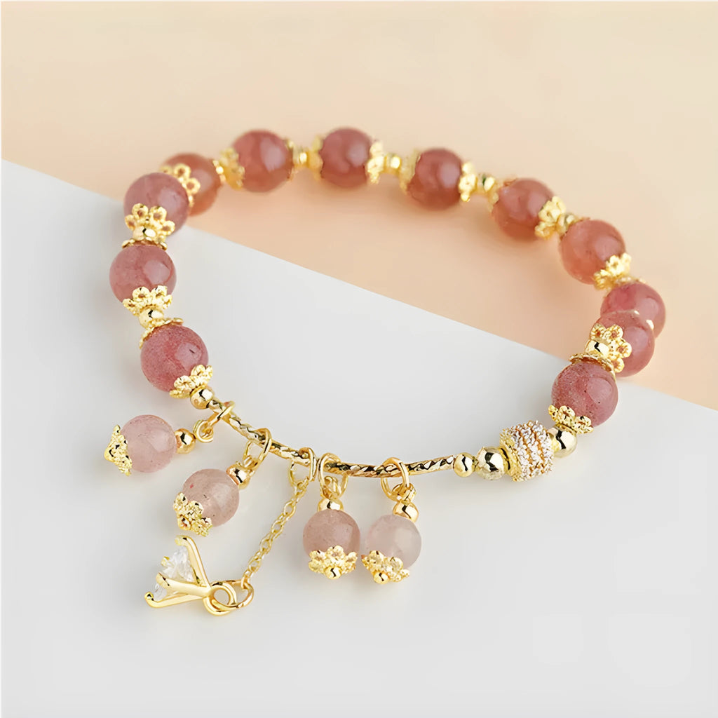 Pink women's bracelet with heart-shaped strawberry quartz crystal and pearl decorative elements