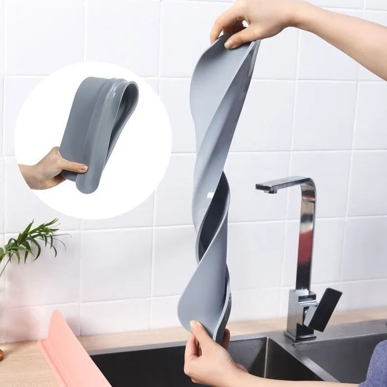 Silicone sink water blocking plate in grey, blue, and black colours showing 52mm width