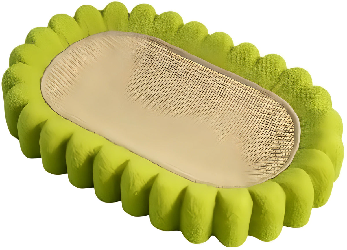 Green oval-shaped cat scratcher pad with sisal surface serving as a scratching area and cat bed.