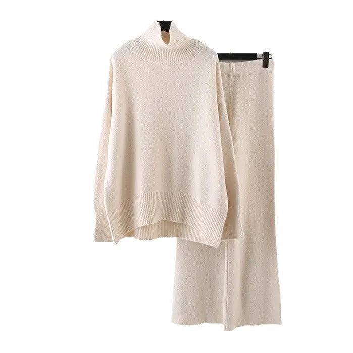 Women's beige acrylic sweater and wide-leg trousers two-piece set on a hanger