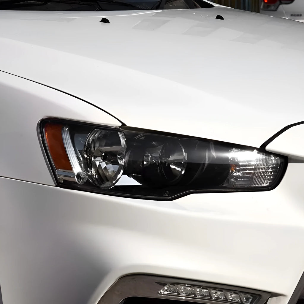 Transparent plastic headlight housing cover for car lighting replacement measuring 50x30x20mm