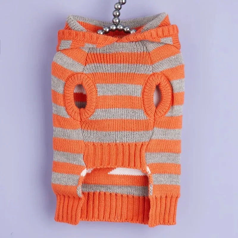 Orange Halloween pet sweater with striped pattern and hooded fur ball design for cats and dogs