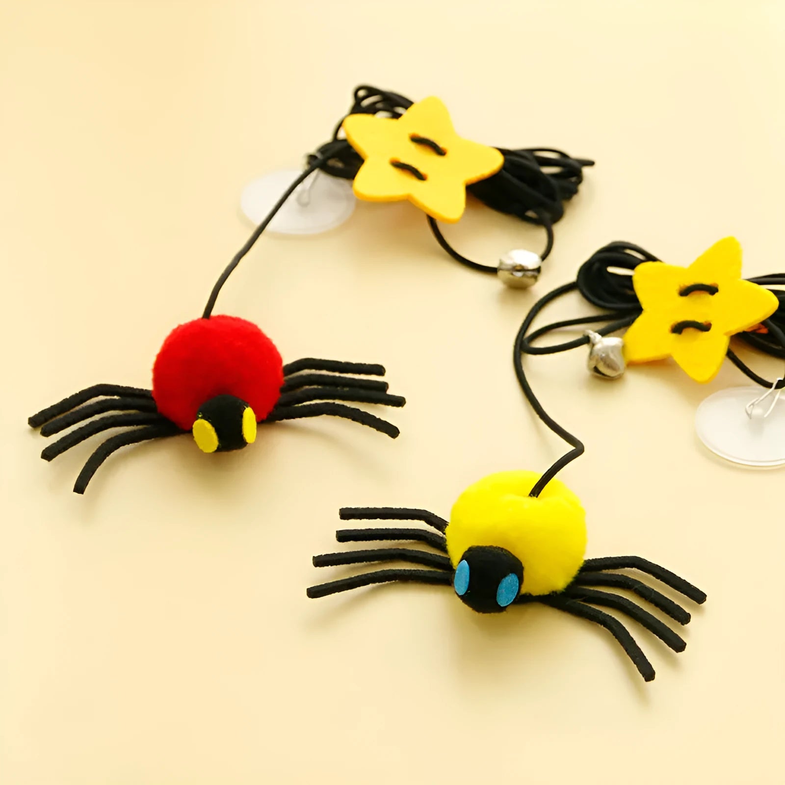 Hanging door cat toy with elastic rope, colourful feather wand, swinging spider decoration and small bell
