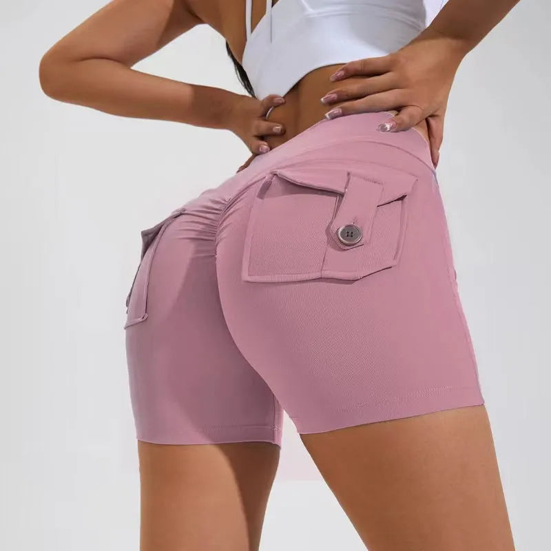 Women's high-waist fitness shorts in quick-dry nylon with side pockets, shown in Electric Blue.