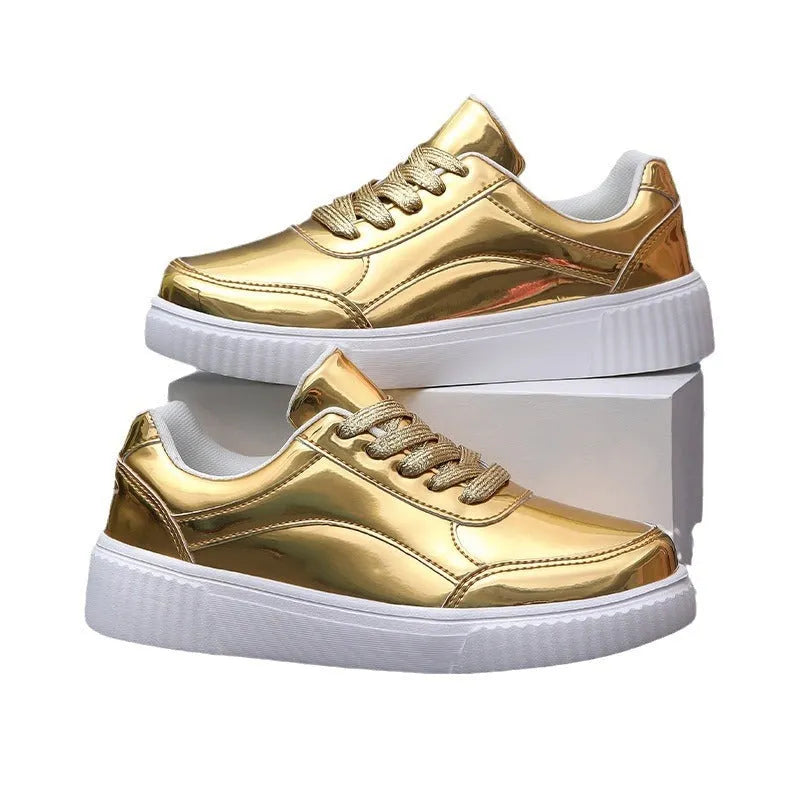 Rose gold sequin platform sneaker with thick sole and round toe on a white background.