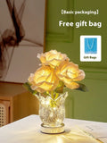 White crystal flowers touch control table lamp with USB charging cable on bedside table